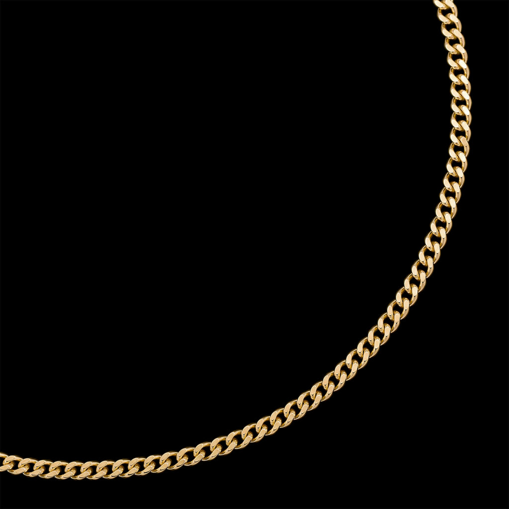 Detalle de textura y eslabones Cuban Link 1mm en oro sólido 14K